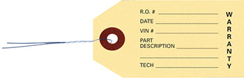 Manila tags with wire inserted - warranty parts