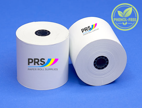 Two white paper roll supplies with the PRS logo, one standing upright and the other lying on its side, set against a solid blue background. A green circular 'Phenol-Free' badge is in the top right corner.